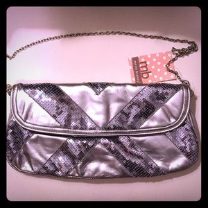 Melie Bianco striped sequin Clutch in silver